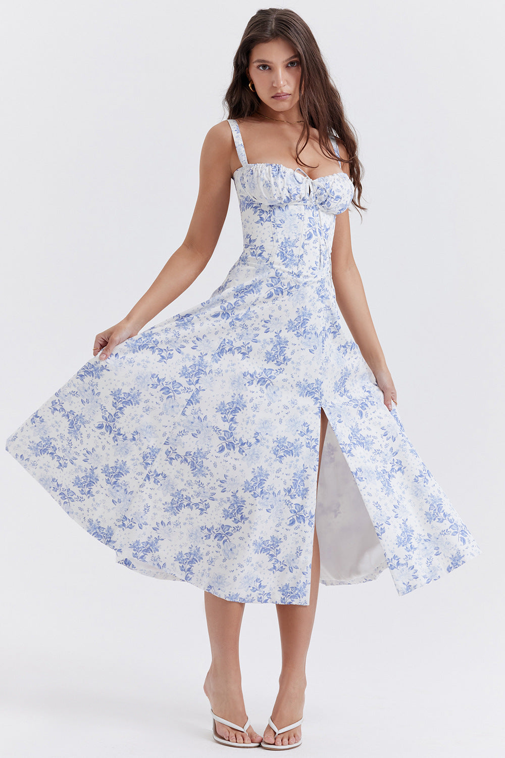 Elegant sleeveless women's party dress with floral pattern, slit, and sweetheart neckline