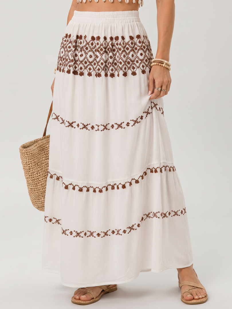 Silon | Midi dress with spaghetti straps and embroidery detail