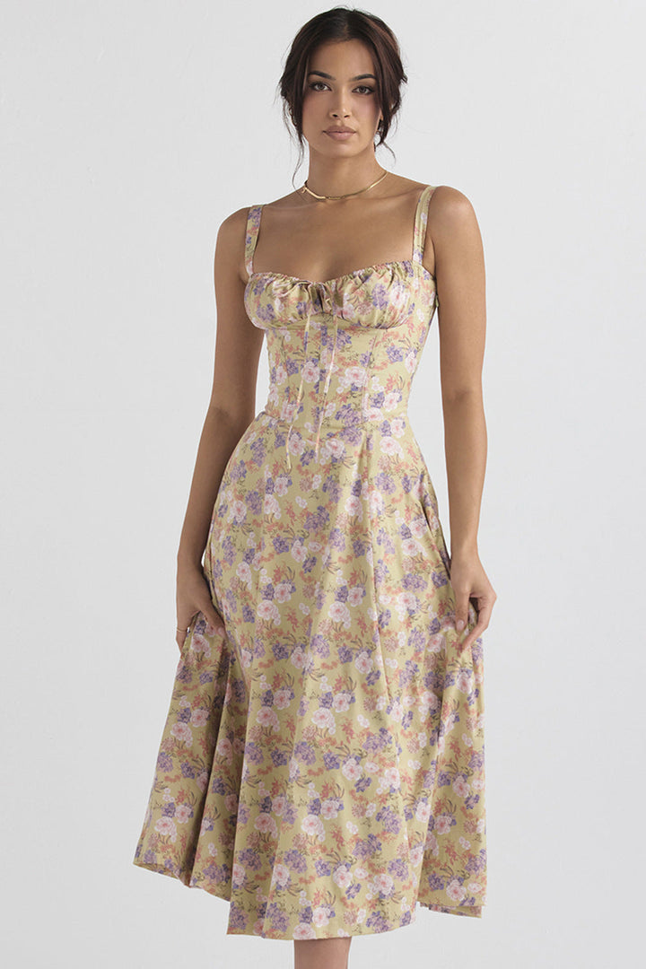 Elegant sleeveless women's party dress with floral pattern, slit, and sweetheart neckline