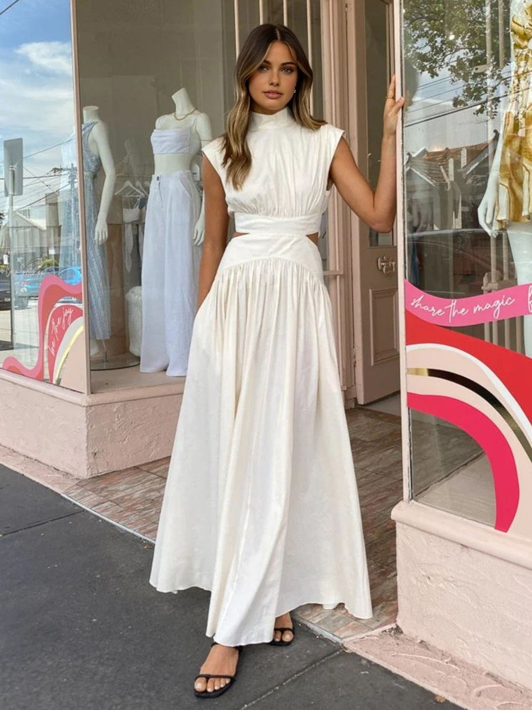 Sleeveless maxi dress with stand-up collar and waist cut-out
