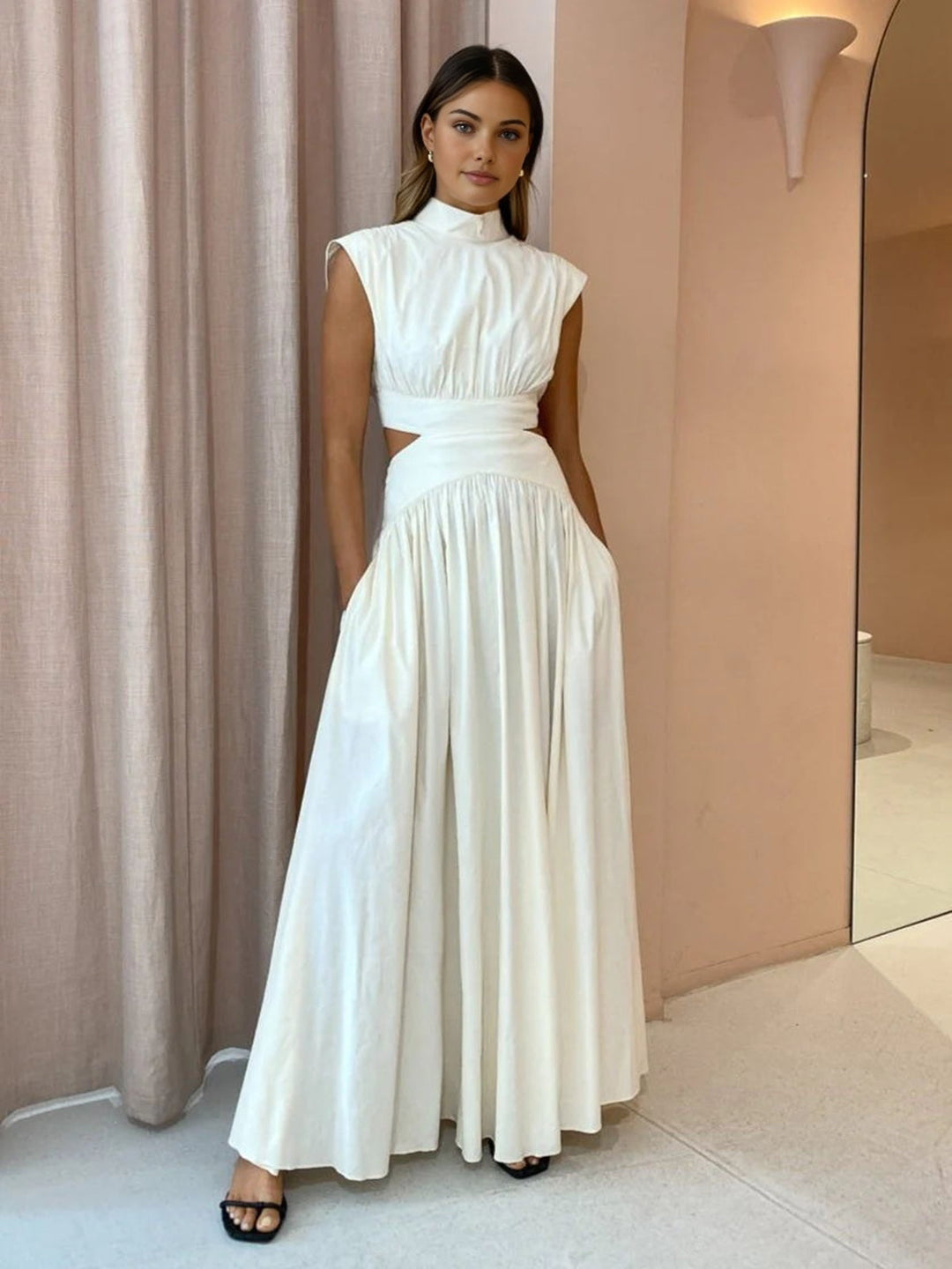 Sleeveless maxi dress with stand-up collar and waist cut-out