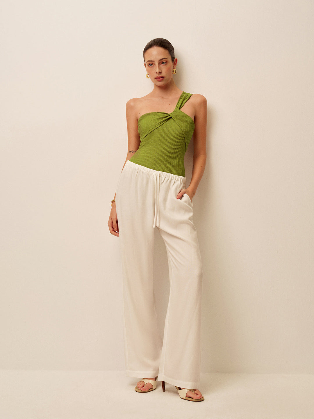 Asymmetric swimsuit with twist & ruching – figure shaping
