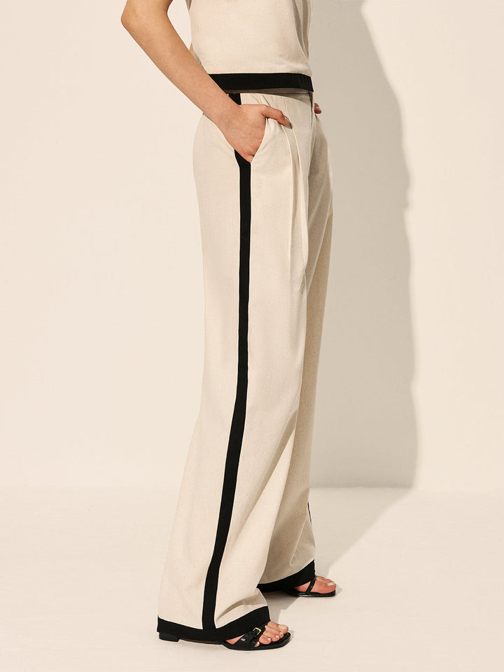 Pantalones de lino y algodón con costura de contraste y cremallera