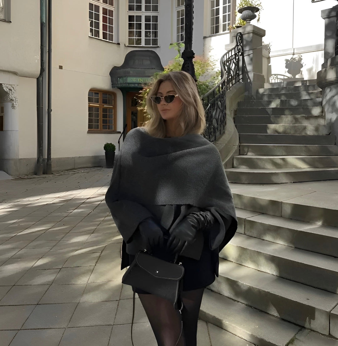 Women's cape coat made of soft fabric with asymmetrical design