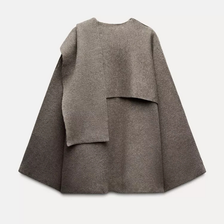 Women's cape coat made of soft fabric with asymmetrical design