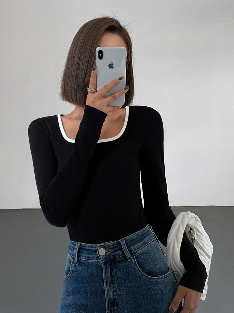 Women's long-sleeve jersey top with contrast neckline