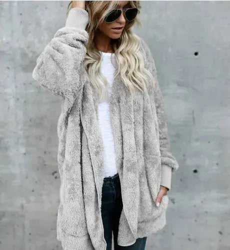 Veste pour femme en teddy polaire décontractée avec poches pratiques