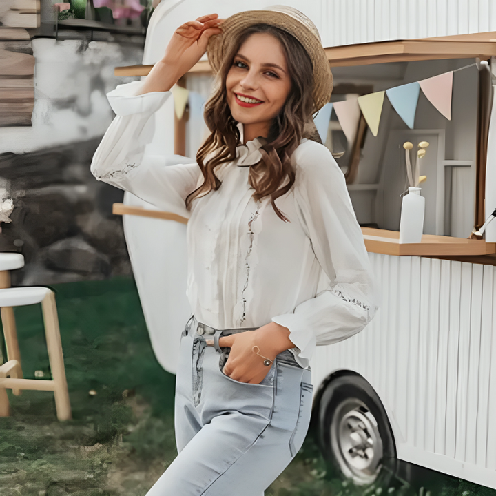 Elegant long-sleeve blouse for women with button details – ideal for festive occasions