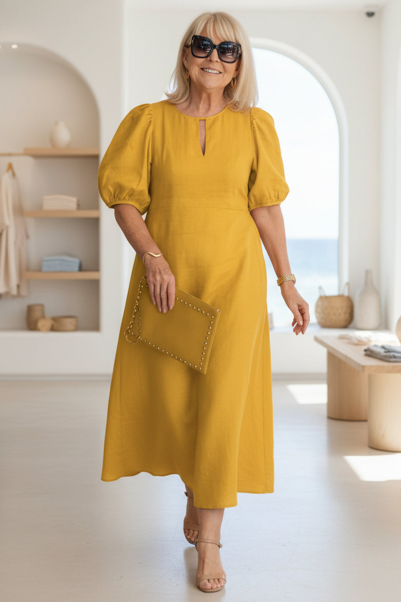 Elegantes Maxikleid mit Puffärmeln: Stilvoll für festliche Anlässe 4