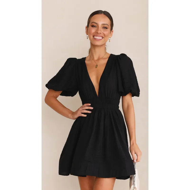 Elegant sleeveless mini dress – vegan leather look