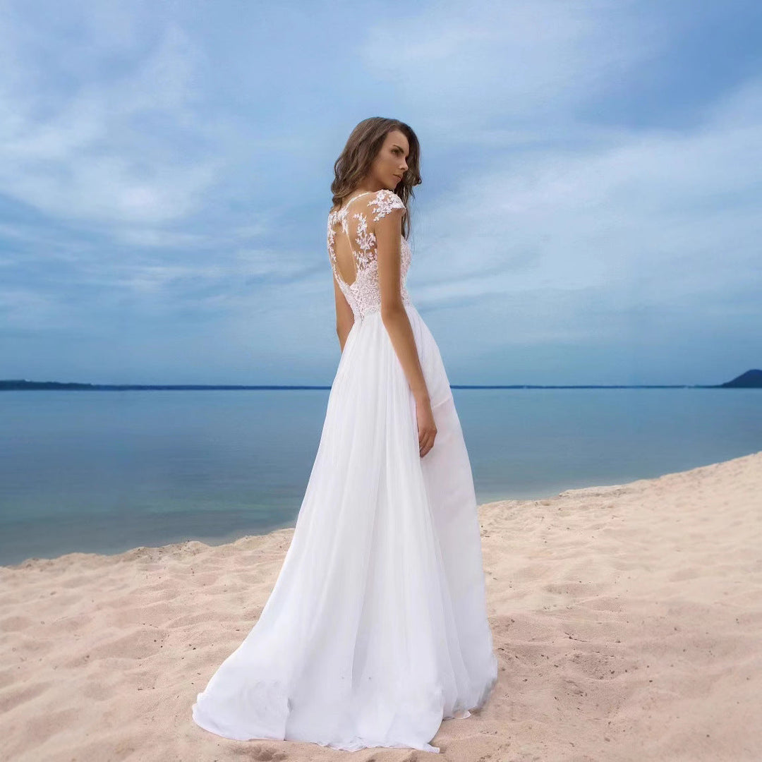 Elegantes, romantisches Brautkleid mit Spitzenoberteil – fließender Rock