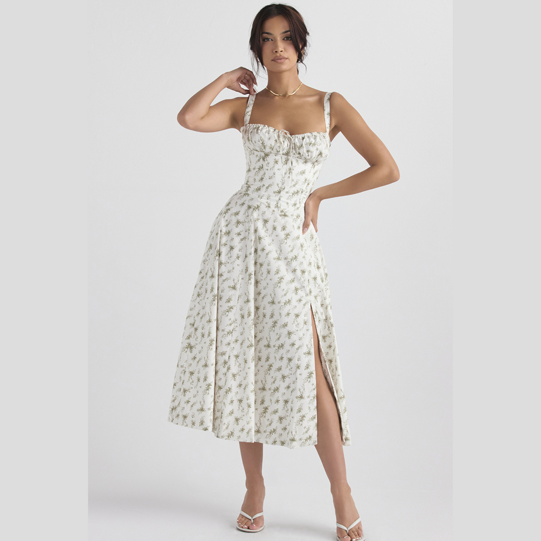 Elegant sleeveless women's party dress with floral pattern, slit, and sweetheart neckline