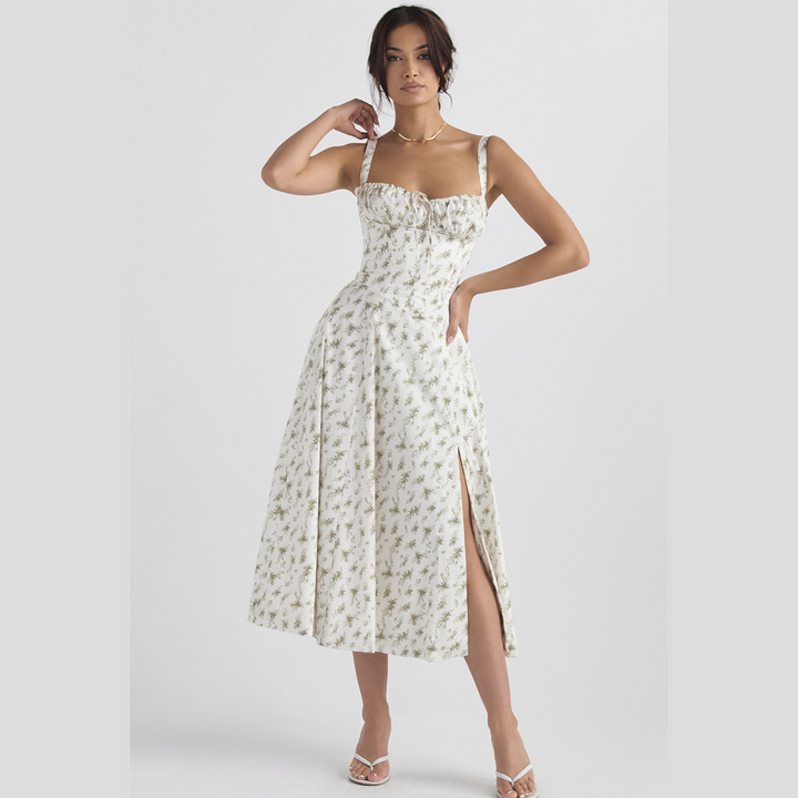 Elegant sleeveless women's party dress with floral pattern, slit, and sweetheart neckline