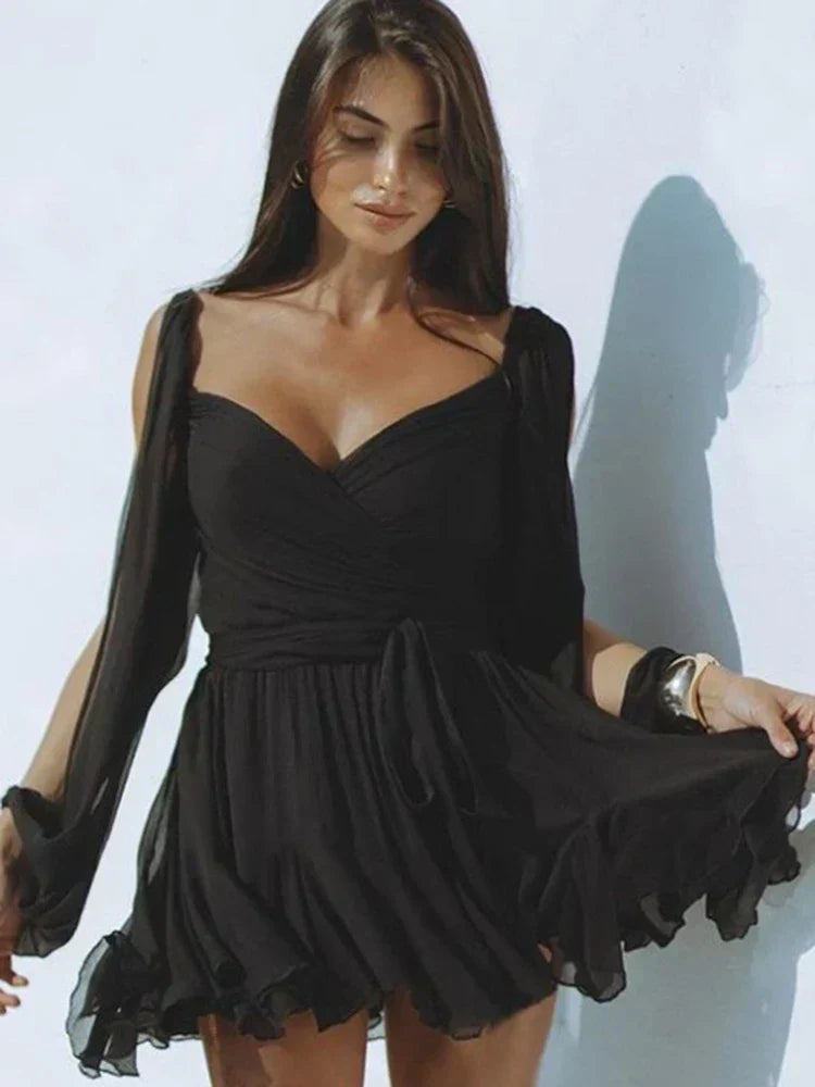 Elegant women's wrap dress with pleated skirt