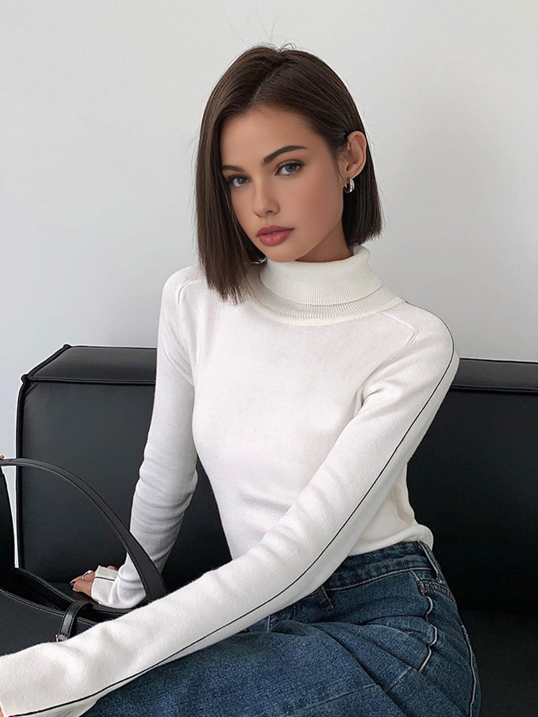 Stylish turtleneck sweater for women with contrast piping made from high-quality material blend