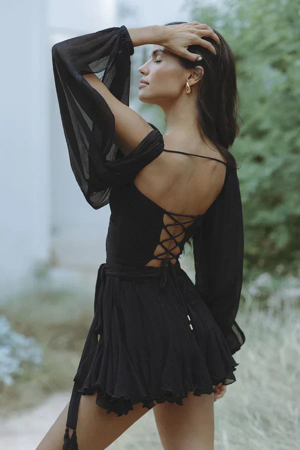 Elegant women's wrap dress with pleated skirt