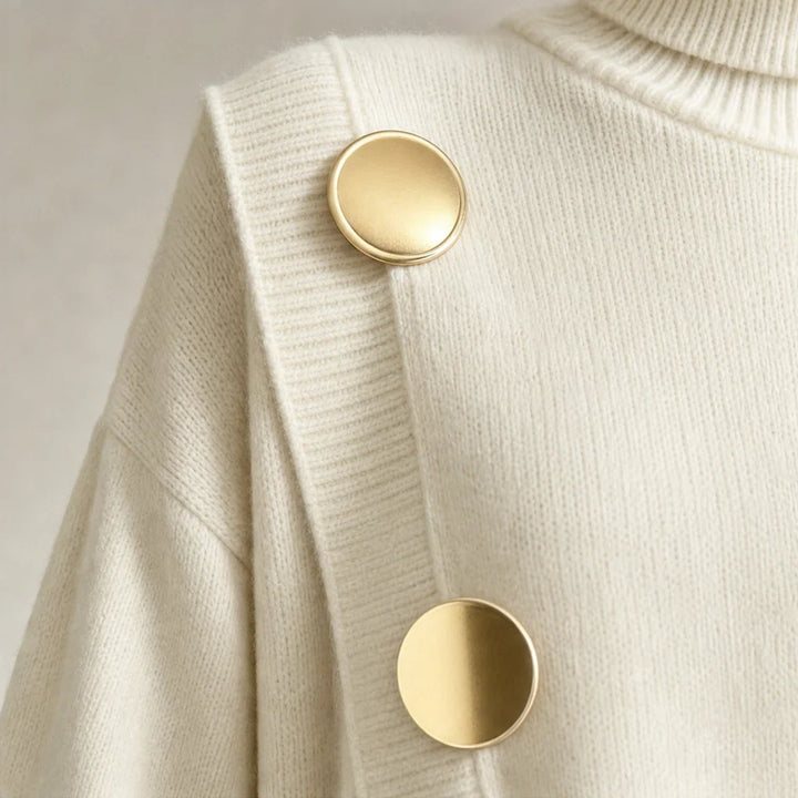Knit two-piece set with gold buttons and an asymmetrical cut