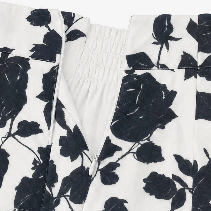 Two-piece set with a blouse-style top and floral skirt
