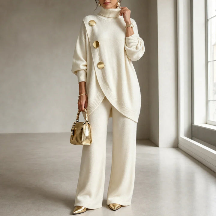 Knit two-piece set with gold buttons and an asymmetrical cut
