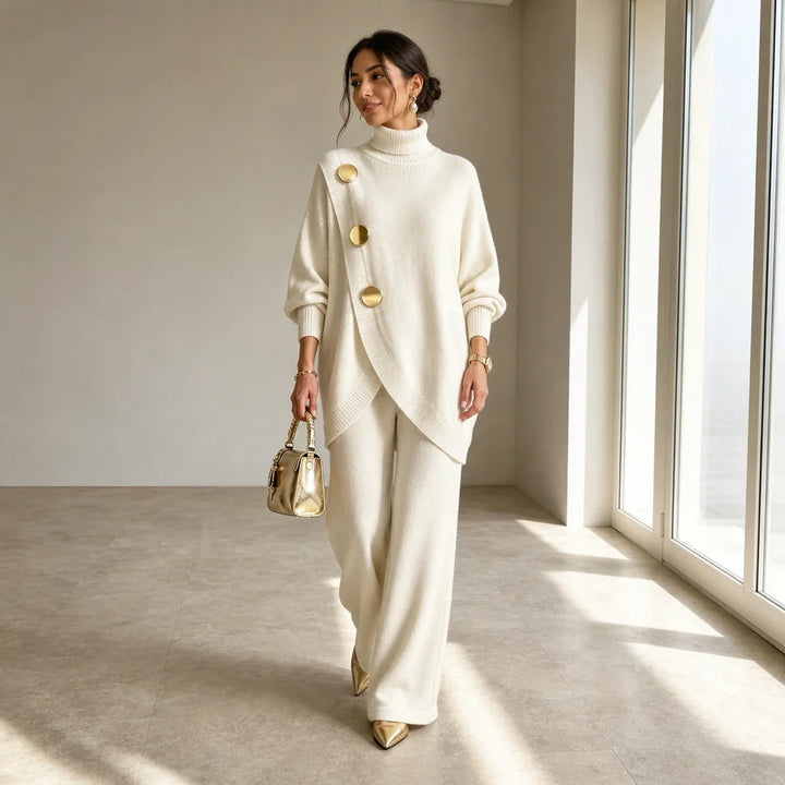 Knit two-piece set with gold buttons and an asymmetrical cut