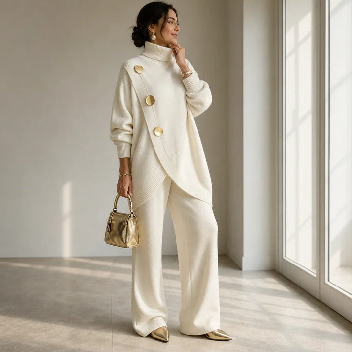 Knit two-piece set with gold buttons and an asymmetrical cut