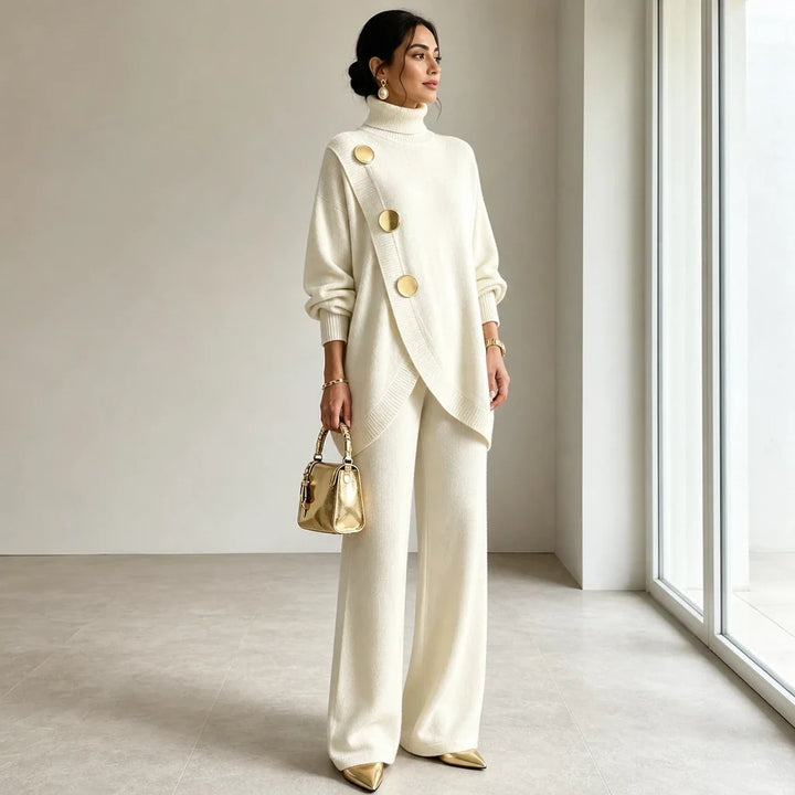 Knit two-piece set with gold buttons and an asymmetrical cut