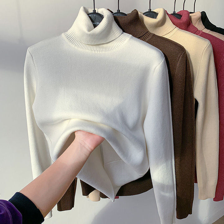 Damski dopasowany sweter z golfem z cienkiej dzianiny ze stretchem i prążkowanymi mankietami